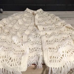 Cream knitted crocheted one button poncho with slits on each side OSFM